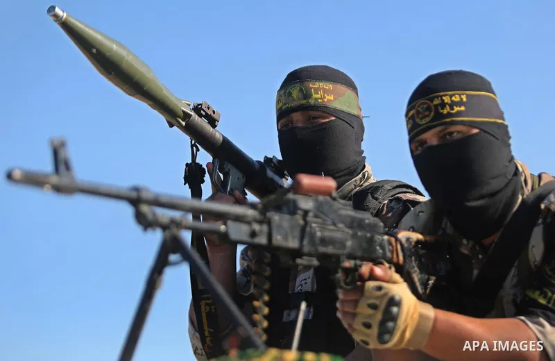 Palestinian militants from the Al-Quds Brigades, the armed wing of the Islamic Jihad movement, take part in a military parade, in Khan younis in the southern Gaza strip, on March 4, 2017. Photo by Ashraf Amra