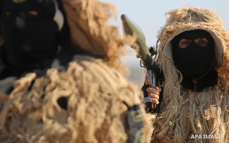 Palestinian militants from the Al-Quds Brigades, the armed wing of the Islamic Jihad movement, take part in a military parade, in Khan younis in the southern Gaza strip, on March 4, 2017. Photo by Ashraf Amra