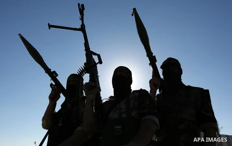 Palestinian militants from the Al-Quds Brigades, the armed wing of the Islamic Jihad movement, take part in a military parade, in Khan younis in the southern Gaza strip, on March 4, 2017. Photo by Ashraf Amra