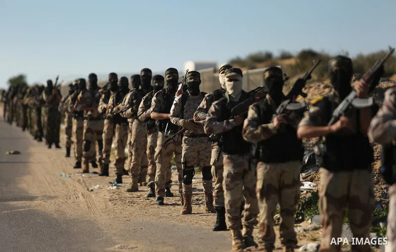Palestinian militants from the Al-Quds Brigades, the armed wing of the Islamic Jihad movement, take part in a military parade, in Khan younis in the southern Gaza strip, on March 4, 2017. Photo by Ashraf Amra