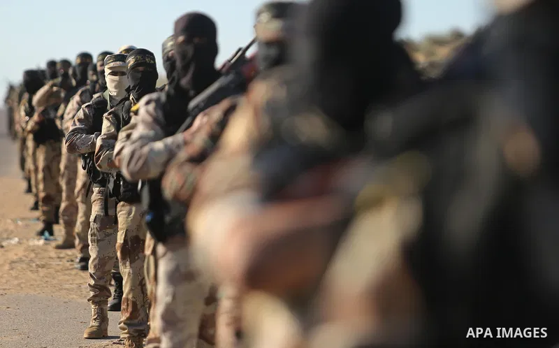 Palestinian militants from the Al-Quds Brigades, the armed wing of the Islamic Jihad movement, take part in a military parade, in Khan younis in the southern Gaza strip, on March 4, 2017. Photo by Ashraf Amra