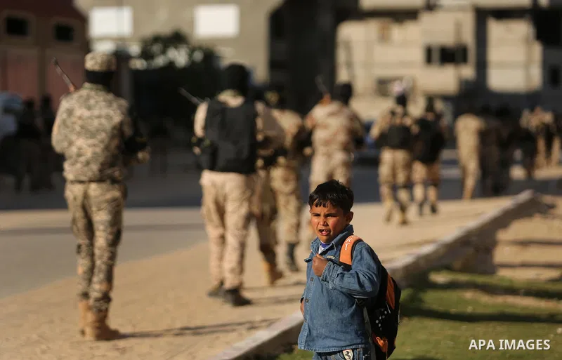 Palestinian militants from the Al-Quds Brigades, the armed wing of the Islamic Jihad movement, take part in a military parade, in Khan younis in the southern Gaza strip, on March 4, 2017. Photo by Ashraf Amra