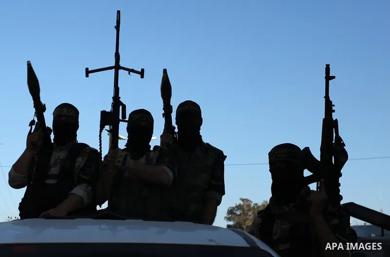 Palestinian militants from the Al-Quds Brigades, the armed wing of the Islamic Jihad movement, take part in a military parade, in Khan younis in the southern Gaza strip, on March 4, 2017. Photo by Ashraf Amra