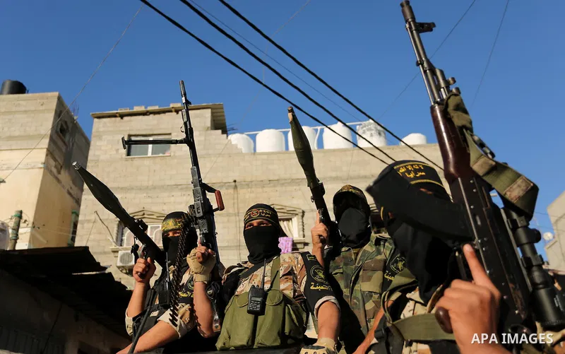 Palestinian militants from the Al-Quds Brigades, the armed wing of the Islamic Jihad movement, take part in a military parade, in Khan younis in the southern Gaza strip, on March 4, 2017. Photo by Ashraf Amra
