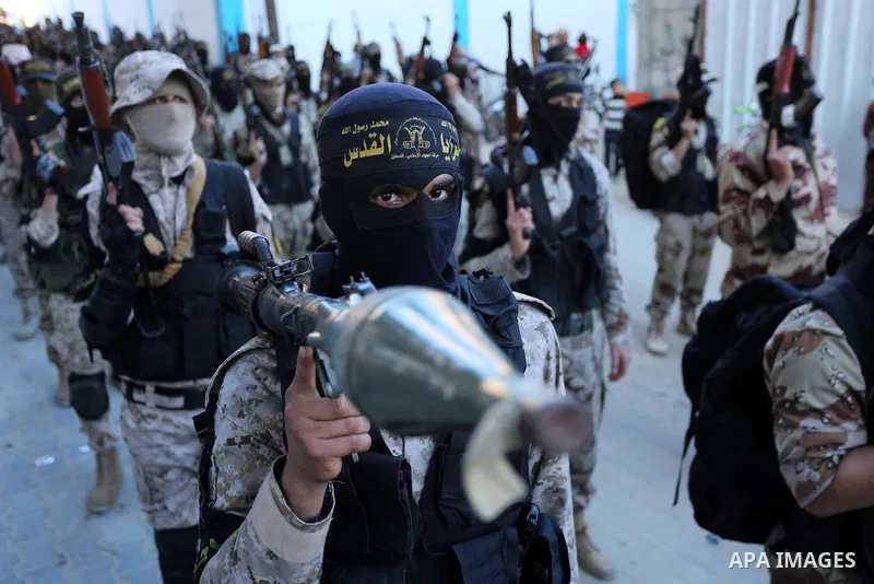 Palestinian militants from the Al-Quds Brigades, the armed wing of the Islamic Jihad movement, take part in a military parade, in Khan younis in the southern Gaza strip, on March 4, 2017. Photo by Ashraf Amra