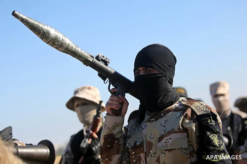 Palestinian militants from the Al-Quds Brigades, the armed wing of the Islamic Jihad movement, take part in a military parade, in Khan younis in the southern Gaza strip, on March 4, 2017. Photo by Ashraf Amra