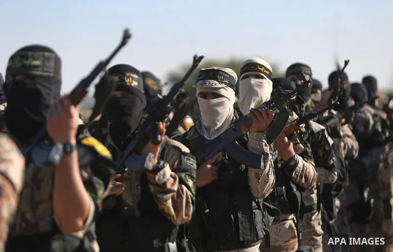 Palestinian militants from the Al-Quds Brigades, the armed wing of the Islamic Jihad movement, take part in a military parade, in Khan younis in the southern Gaza strip, on March 4, 2017. Photo by Ashraf Amra