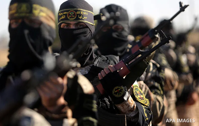 Palestinian militants from the Al-Quds Brigades, the armed wing of the Islamic Jihad movement, take part in a military parade, in Khan younis in the southern Gaza strip, on March 4, 2017. Photo by Ashraf Amra