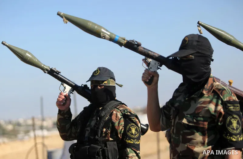 Palestinian militants from the Al-Quds Brigades, the armed wing of the Islamic Jihad movement, take part in a military parade, in Khan younis in the southern Gaza strip, on March 4, 2017. Photo by Ashraf Amra