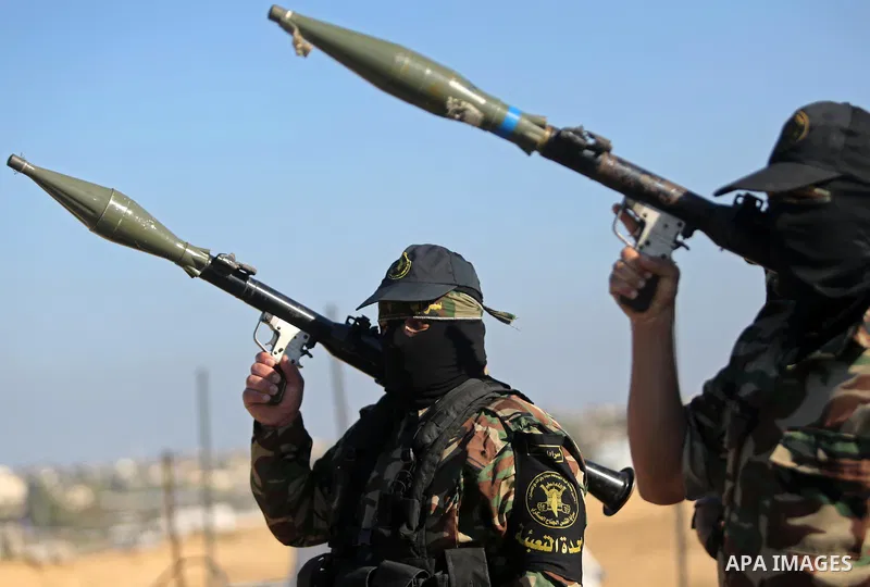 Palestinian militants from the Al-Quds Brigades, the armed wing of the Islamic Jihad movement, take part in a military parade, in Khan younis in the southern Gaza strip, on March 4, 2017. Photo by Ashraf Amra
