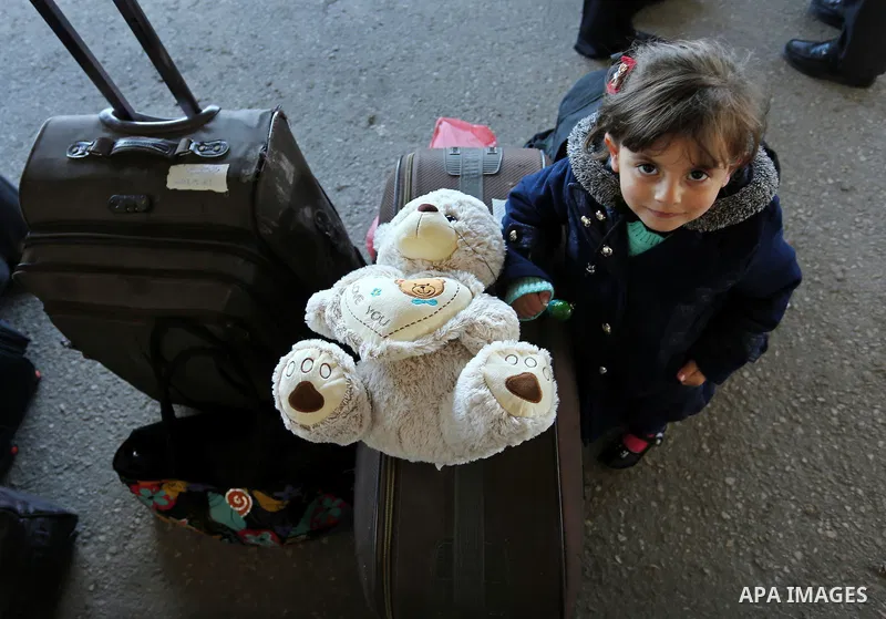 Palestinians wait for travel permits to cross into Egypt through the Rafah border crossing after it was opened by Egyptian authorities for humanitarian cases, in Rafah in the southern Gaza Strip on March 6, 2017. Photo b...