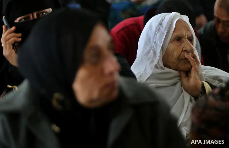 Palestinians wait for travel permits to cross into Egypt through the Rafah border crossing after it was opened by Egyptian authorities for humanitarian cases, in Rafah in the southern Gaza Strip on March 7, 2017. Photo b...