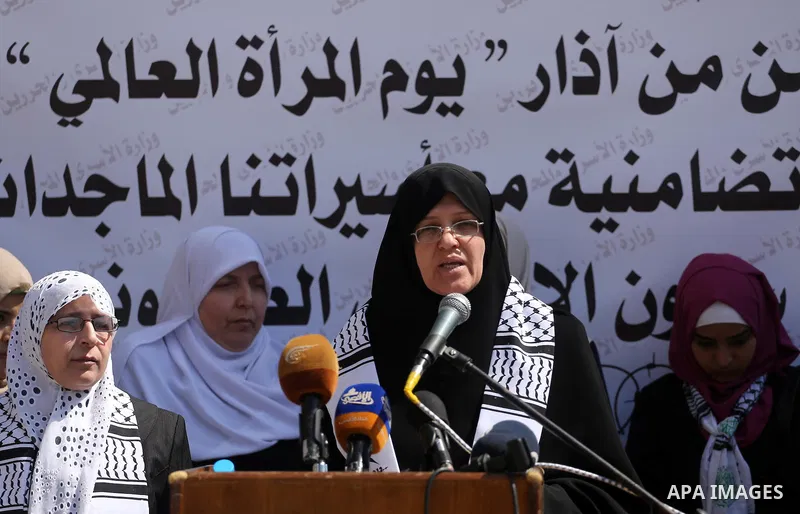 Palestinian women take part in a protest to show soldirity with Palestinian female prisoners in Israeli jails on the occasion of International Women's Day in Gaza City on March 7, 2017. Photo by Mohammed Asad