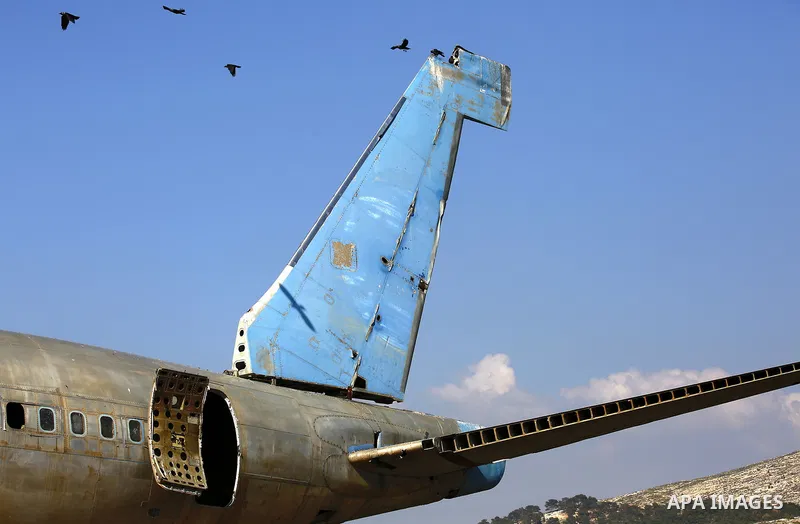 A retired Boeing airplane once belonging to an Israeli airline is seen in the west bank city of Nablus, on March 7, 2017. Photo by Wisam Hashlamoun