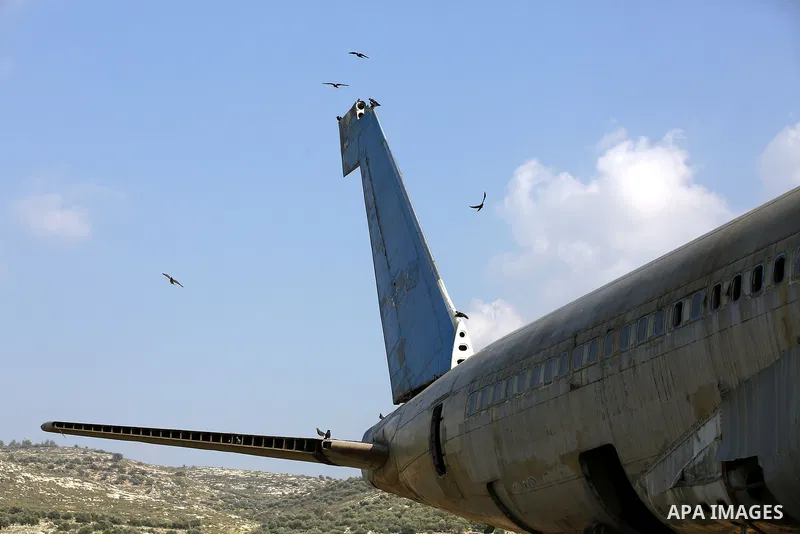 A retired Boeing airplane once belonging to an Israeli airline is seen in the west bank city of Nablus, on March 7, 2017. Photo by Wisam Hashlamoun