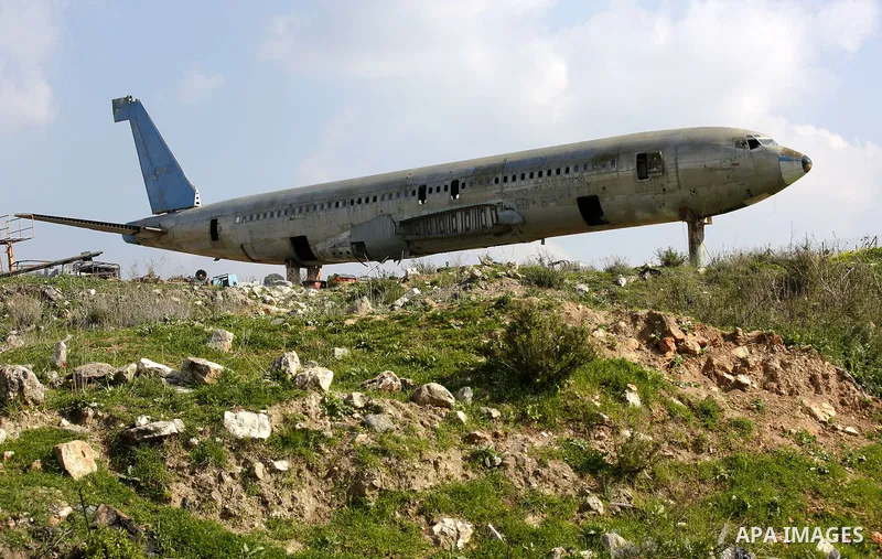 A retired Boeing airplane once belonging to an Israeli airline is seen in the west bank city of Nablus, on March 7, 2017. Photo by Wisam Hashlamoun