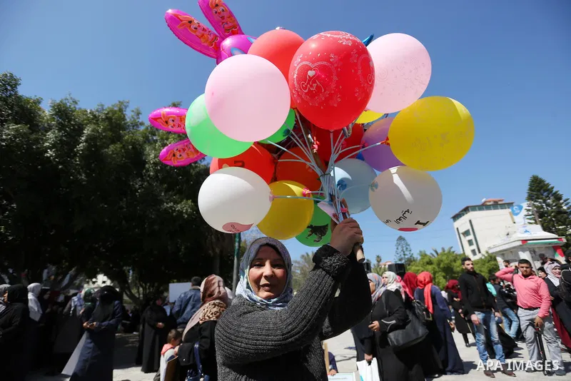 Palestinian women take part during a protest against violence towards women and demanding to end the Israeli occupation on International Women's Day, in Gaza city on March 08, 2017. Photo by Ashraf Amra