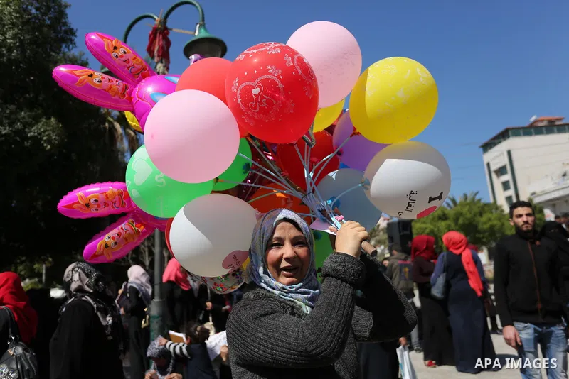 Palestinian women take part during a protest against violence towards women and demanding to end the Israeli occupation on International Women's Day, in Gaza city on March 08, 2017. Photo by Ashraf Amra