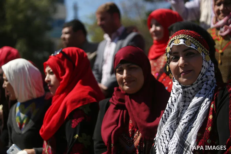 Palestinian women take part during a protest against violence towards women and demanding to end the Israeli occupation on International Women's Day, in Gaza city on March 08, 2017. Photo by Ashraf Amra