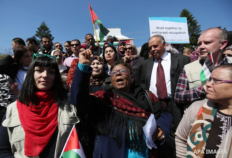 Palestinian women take part during a protest against violence towards women and demanding to end the Israeli occupation on International Women's Day, in Gaza city on March 08, 2017. Photo by Ashraf Amra