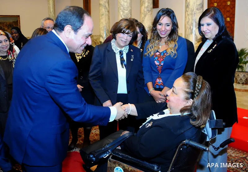 Egyptian President Abdel-Fattah al-Sisi meets with Members of the National Council for Women, in Cairo, capital of Egypt, March 8, 2017. Photo by Egyptian President Office