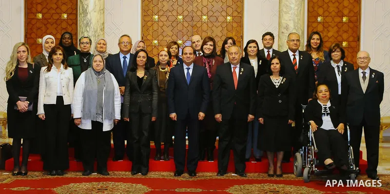Egyptian President Abdel-Fattah al-Sisi meets with Members of the National Council for Women, in Cairo, capital of Egypt, March 8, 2017. Photo by Egyptian President Office