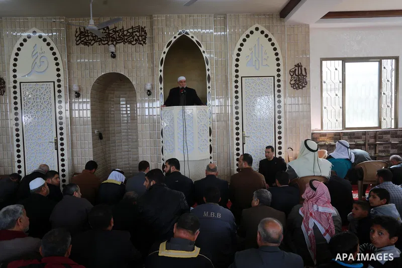 Deputy of the Legislative Council, Ahmed Bahar speaks in the presence of Senior political Hamas leader Ismail Haniya during the opening of a new mosque in Beit Lahiya in the northern Gaza strip on March 10, 2017. Photo b...