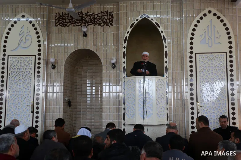 Deputy of the Legislative Council, Ahmed Bahar speaks in the presence of Senior political Hamas leader Ismail Haniya during the opening of a new mosque in Beit Lahiya in the northern Gaza strip on March 10, 2017. Photo b...