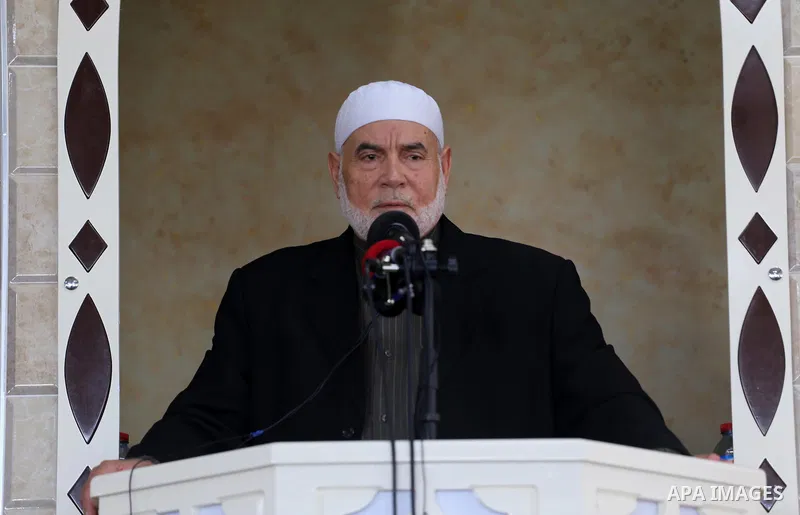Deputy of the Legislative Council, Ahmed Bahar speaks in the presence of Senior political Hamas leader Ismail Haniya during the opening of a new mosque in Beit Lahiya in the northern Gaza strip on March 10, 2017. Photo b...