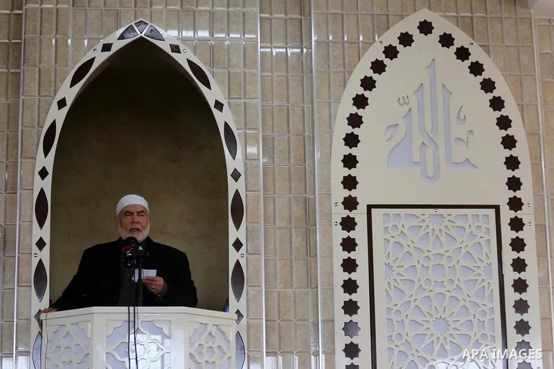 Deputy of the Legislative Council, Ahmed Bahar speaks in the presence of Senior political Hamas leader Ismail Haniya during the opening of a new mosque in Beit Lahiya in the northern Gaza strip on March 10, 2017. Photo b...