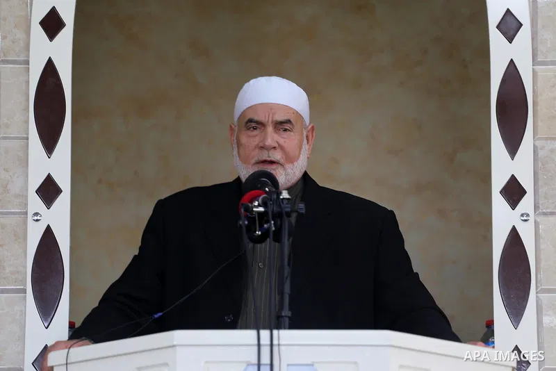 Deputy of the Legislative Council, Ahmed Bahar speaks in the presence of Senior political Hamas leader Ismail Haniya during the opening of a new mosque in Beit Lahiya in the northern Gaza strip on March 10, 2017. Photo b...
