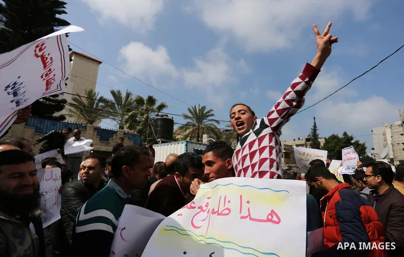 Palestinian factories owners demonstrate on March 13, 2017 outside the UN offices in Gaza City as their business were not yet rebuild since the 2014 war between Hamas militants and Israel. Photo by Ashraf Amra