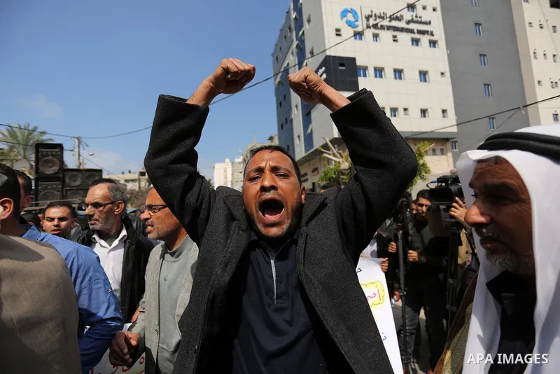 Palestinian factories owners demonstrate on March 13, 2017 outside the UN offices in Gaza City as their business were not yet rebuild since the 2014 war between Hamas militants and Israel. Photo by Ashraf Amra