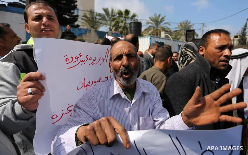 Palestinian factories owners demonstrate on March 13, 2017 outside the UN offices in Gaza City as their business were not yet rebuild since the 2014 war between Hamas militants and Israel. Photo by Ashraf Amra