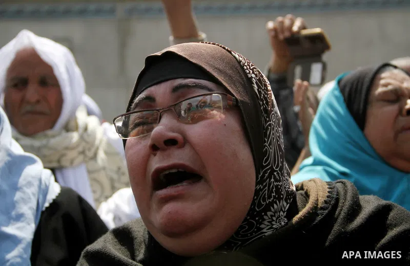 Released detainees wave to their relatives after Egyptian President Abdel Fattah al-Sisi issued a pardon for 203 youths jailed for taking part in demonstrations, as part of a pledge he made months ago to amend a protest...