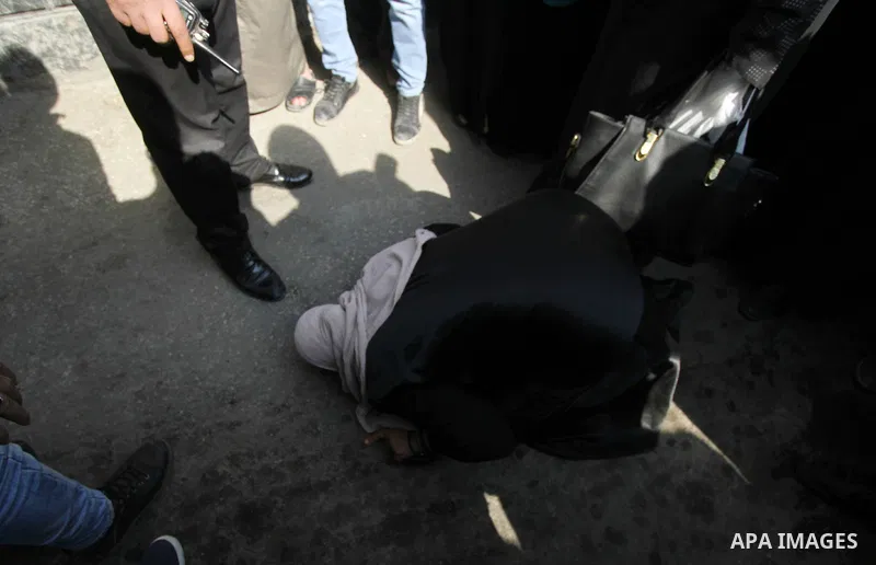 Released detainees wave to their relatives after Egyptian President Abdel Fattah al-Sisi issued a pardon for 203 youths jailed for taking part in demonstrations, as part of a pledge he made months ago to amend a protest...