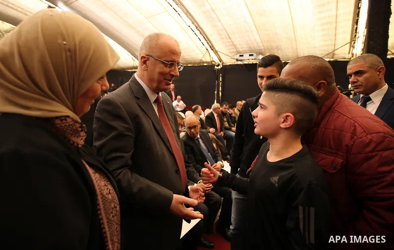 Palestinian Prime Minister, Rami Hamdallah, attends Third International Conference of prisoners, in the West Bank city of Ramallah, on March 15, 2017. Photo by Prime Minister Office