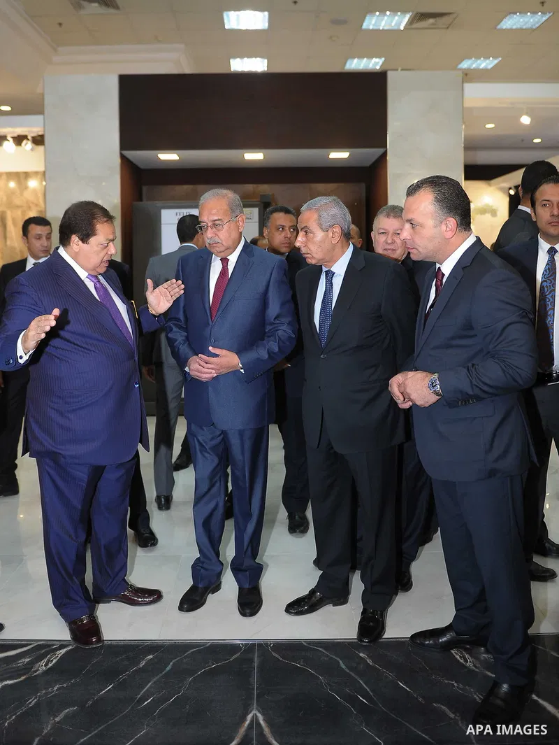 Egyptian Prime Minister Ismail Sharif attends Cairo International exposition, in Cairo, Egypt, on March 15, 2017. Photo by Stringer