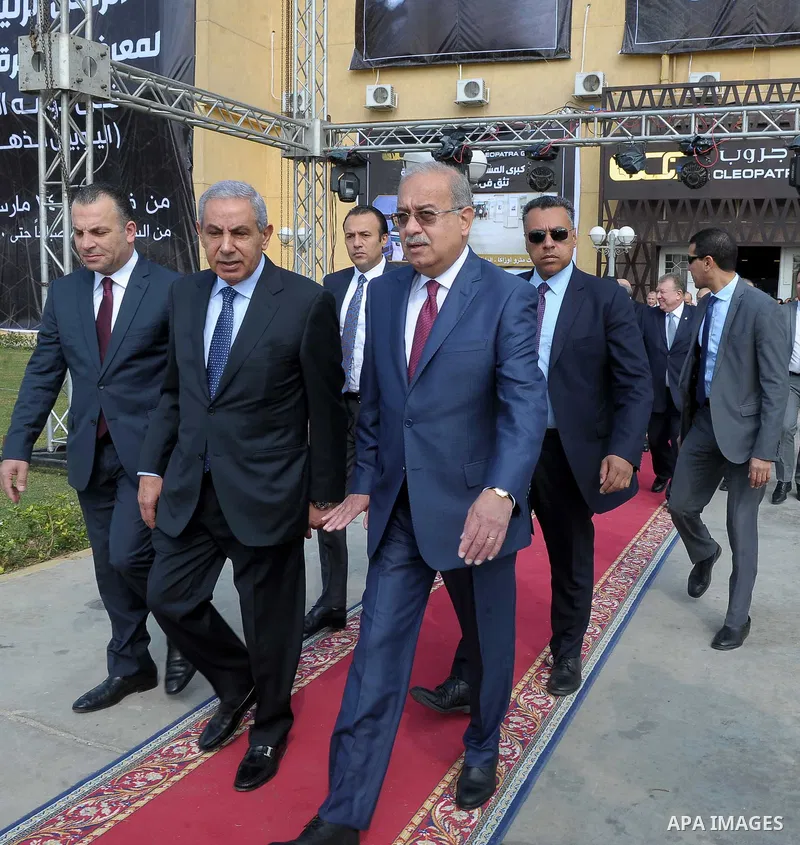 Egyptian Prime Minister Ismail Sharif attends Cairo International exposition, in Cairo, Egypt, on March 15, 2017. Photo by Stringer
