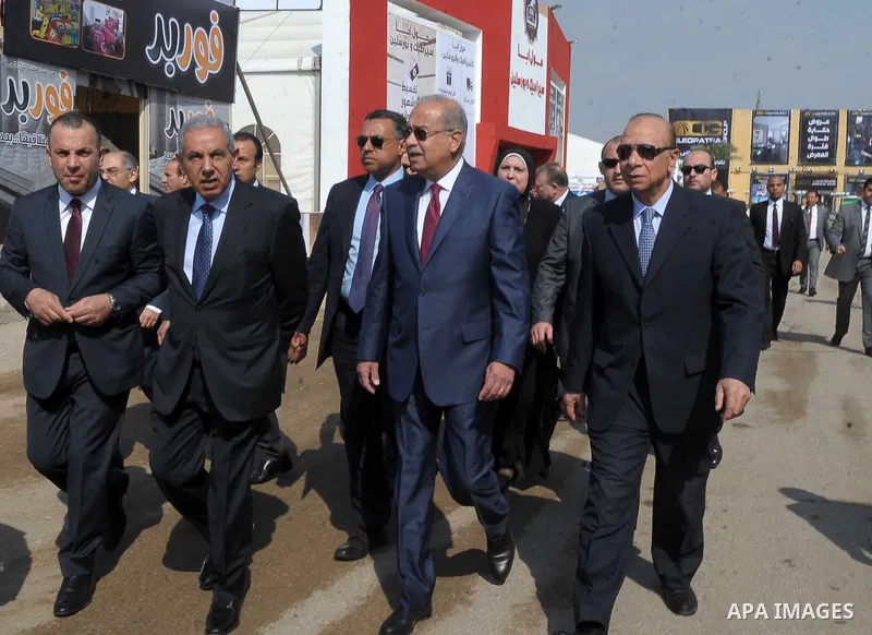 Egyptian Prime Minister Ismail Sharif attends Cairo International exposition, in Cairo, Egypt, on March 15, 2017. Photo by Stringer