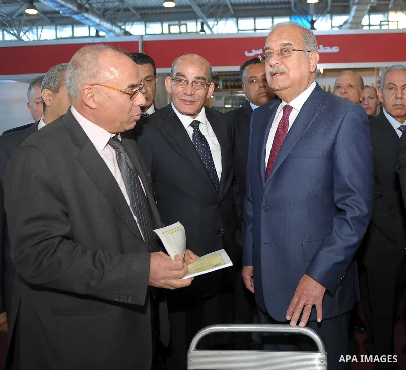 Egyptian Prime Minister Ismail Sharif attends Cairo International exposition, in Cairo, Egypt, on March 15, 2017. Photo by Stringer