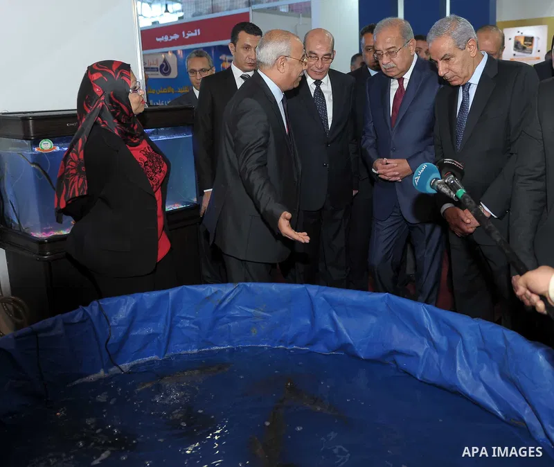 Egyptian Prime Minister Ismail Sharif attends Cairo International exposition, in Cairo, Egypt, on March 15, 2017. Photo by Stringer