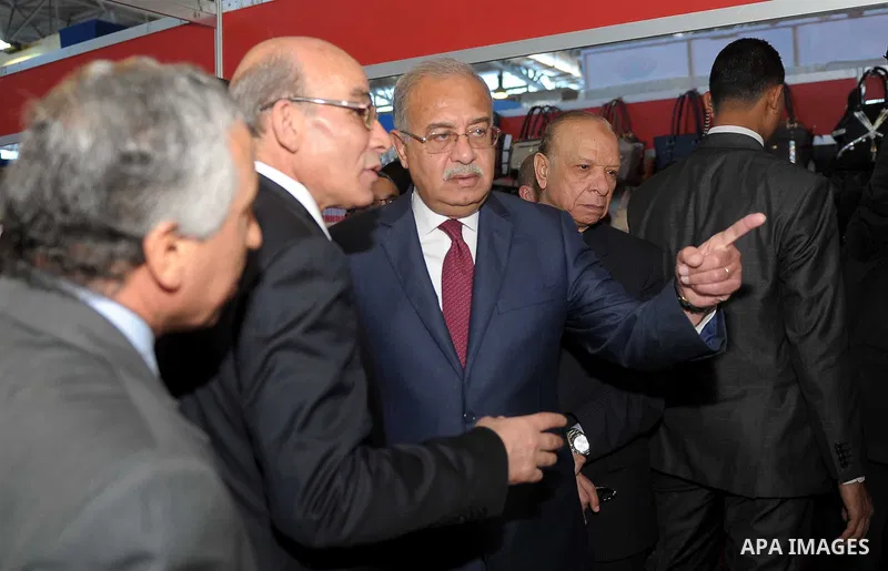 Egyptian Prime Minister Ismail Sharif attends Cairo International exposition, in Cairo, Egypt, on March 15, 2017. Photo by Stringer