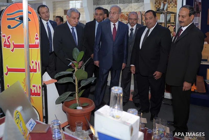 Egyptian Prime Minister Ismail Sharif attends Cairo International exposition, in Cairo, Egypt, on March 15, 2017. Photo by Stringer
