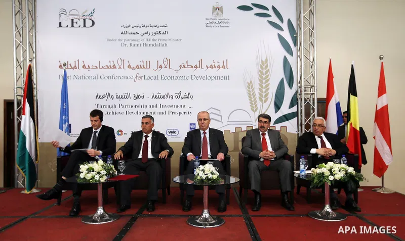 Palestinian Prime Minister Rami Hamdallah attends the First national conference for local economic development in the West Bank city of Ramallah on March 15, 2017. Photo by Prime Minister Office