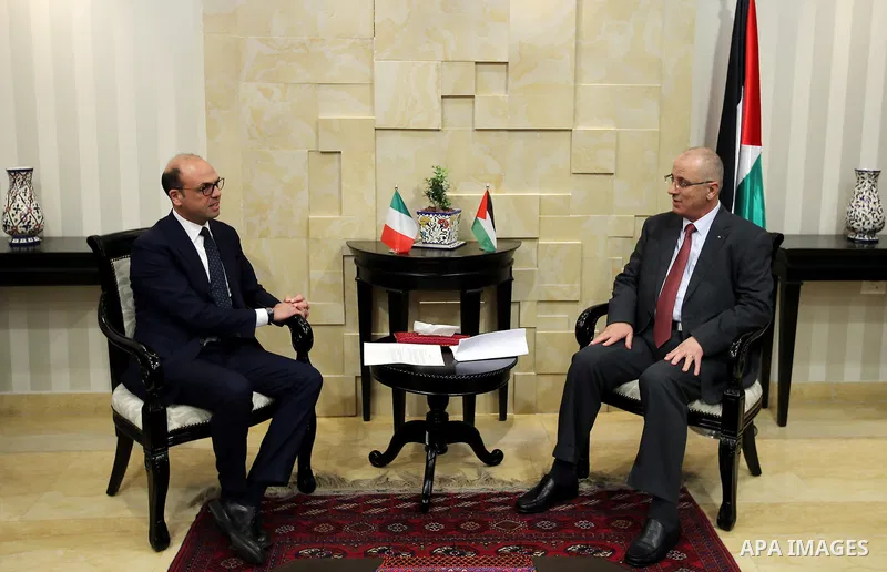 Palestinian Prime Minister Rami Hamdallah meets with Italian Foreign Minister Angelino Alfano, in the West Bank city of Ramallah on March 15, 2017. Photo by Prime Minister Office