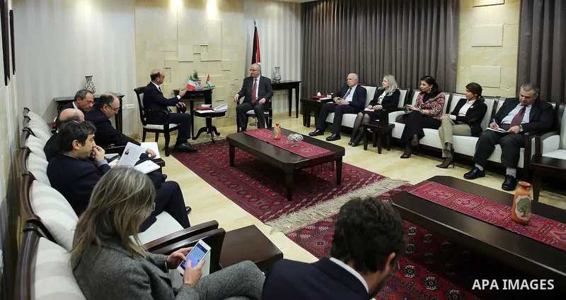 Palestinian Prime Minister Rami Hamdallah meets with Italian Foreign Minister Angelino Alfano, in the West Bank city of Ramallah on March 15, 2017. Photo by Prime Minister Office