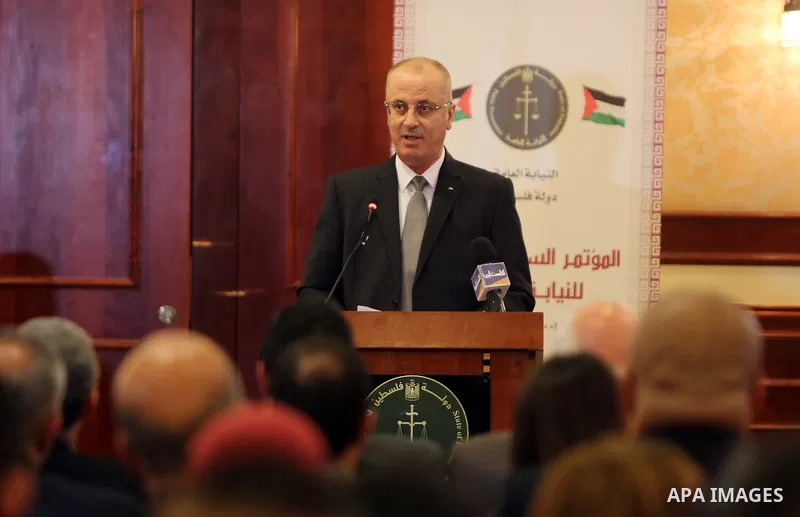 Palestinian Prime Minister Rami Hamdallah, attends the Seventh Annual Conference of Public Prosecution, in the West Bank city of Ramallah, in the March 16, 2017. Photo by Prime Minister Office