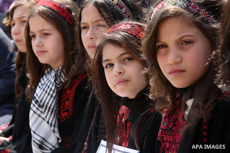 Palestinian children take part in a solidarity demonstration for Palestinian female prisoners in Israeli jails in front of International Red Cross office in Gaza City, Gaza on March 16, 2017. Photo by Ashraf Amra