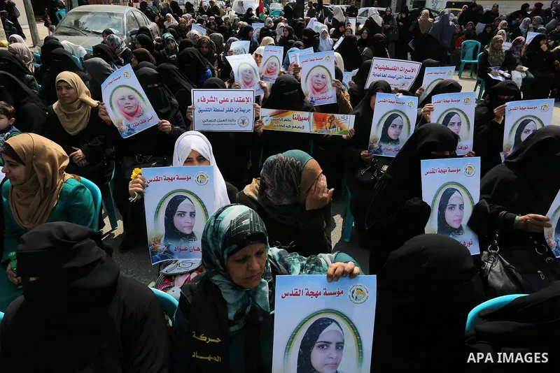 Palestinians take part in a solidarity demonstration for Palestinian female prisoners in Israeli jails in front of International Red Cross office in Gaza City, Gaza on March 16, 2017. Photo by Ashraf Amra